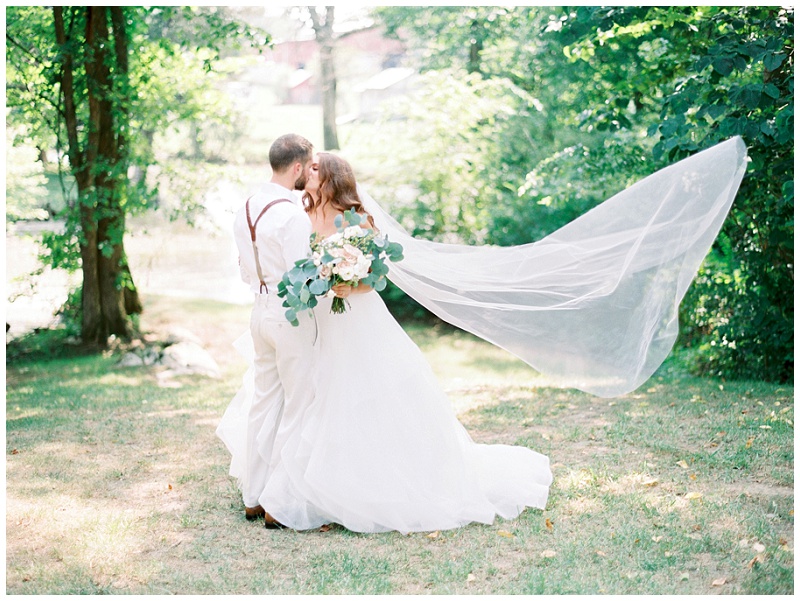 bride and groom golden hour portrait outside The Millstone venue
