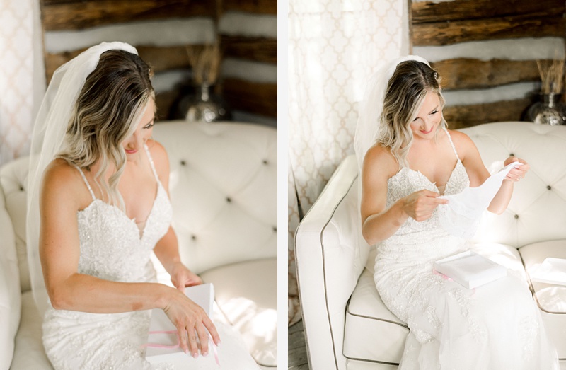 Bride putting on wedding dress The Millstone wedding venue
