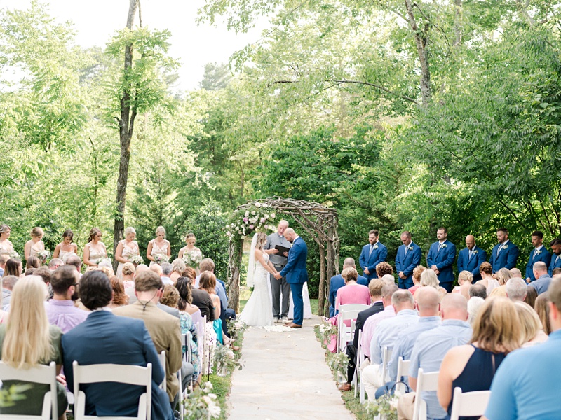 Rustic mill ceremony backdrop The Millstone venue