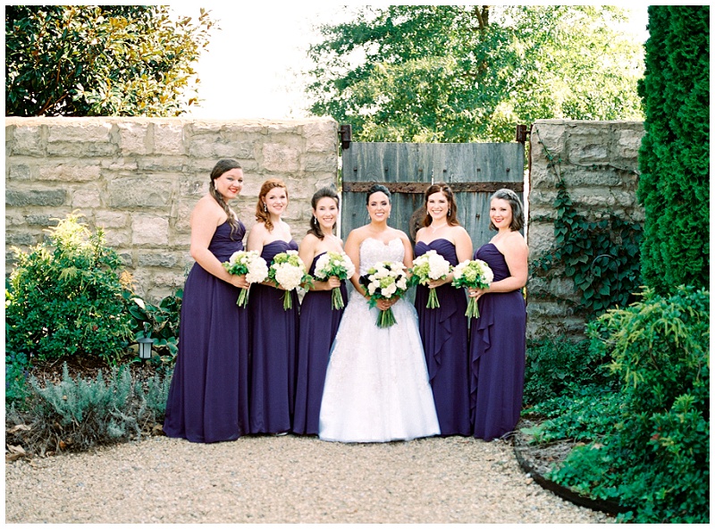 Bridesmaids laughing during summer wedding