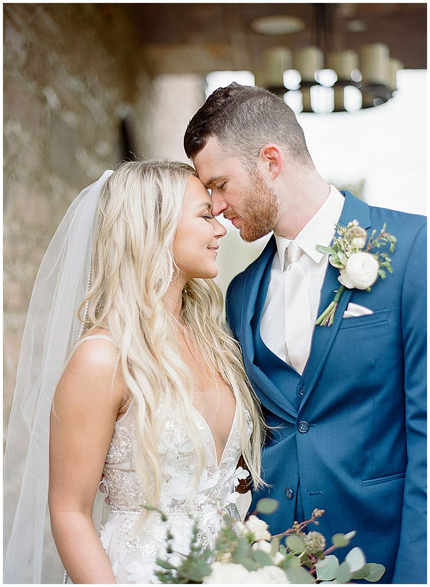 Bride and groom first kiss moment
