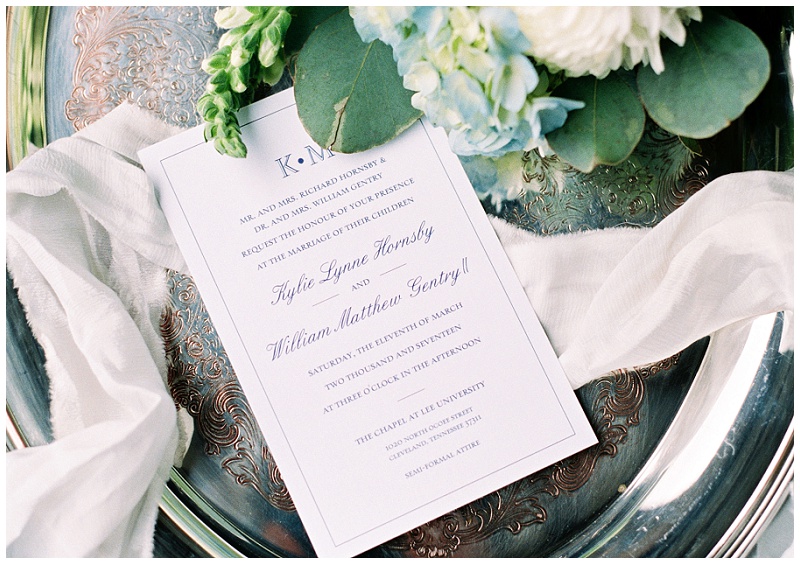 invitation flat lay at Black Fox Farms Cleveland TN
