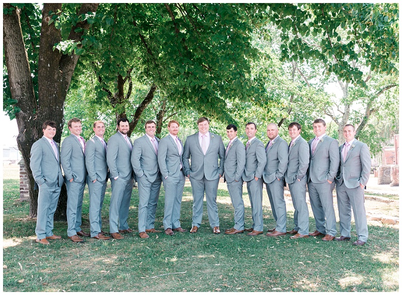 fun groomsmen portraits Old Woolen Mill