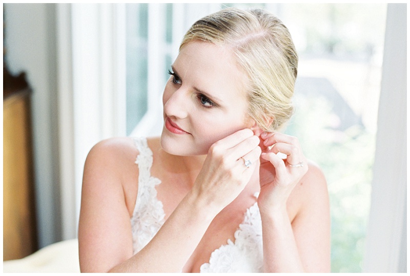 bride putting on dress in Dalton Georgia
