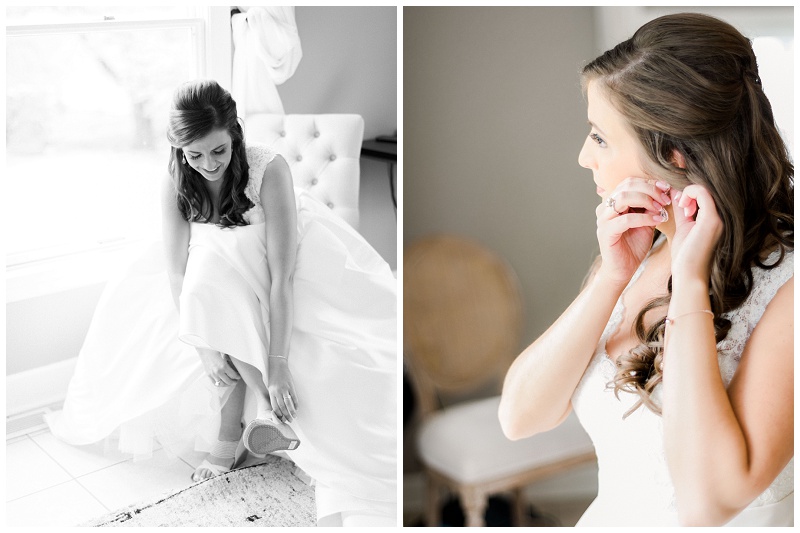 bride putting on earrings