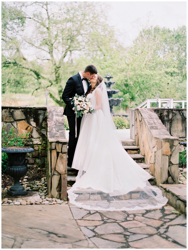 bride and groom smiling candidly 