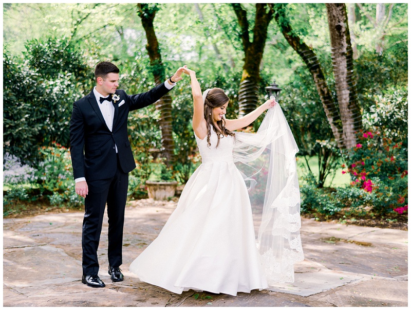 intimate newlywed dancing outside in a garden portraits Tennessee