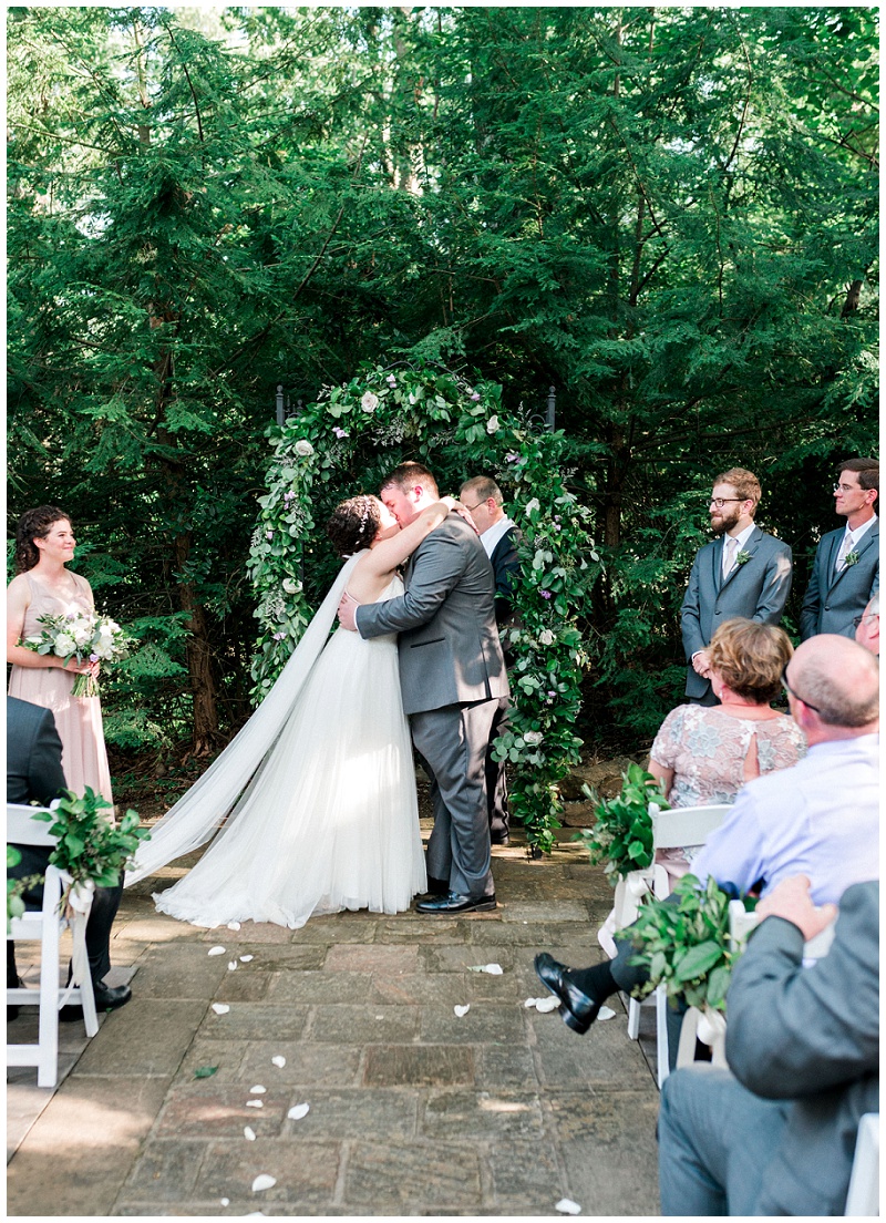 bride and groom first kiss during ceremony at Grandview Tennessee