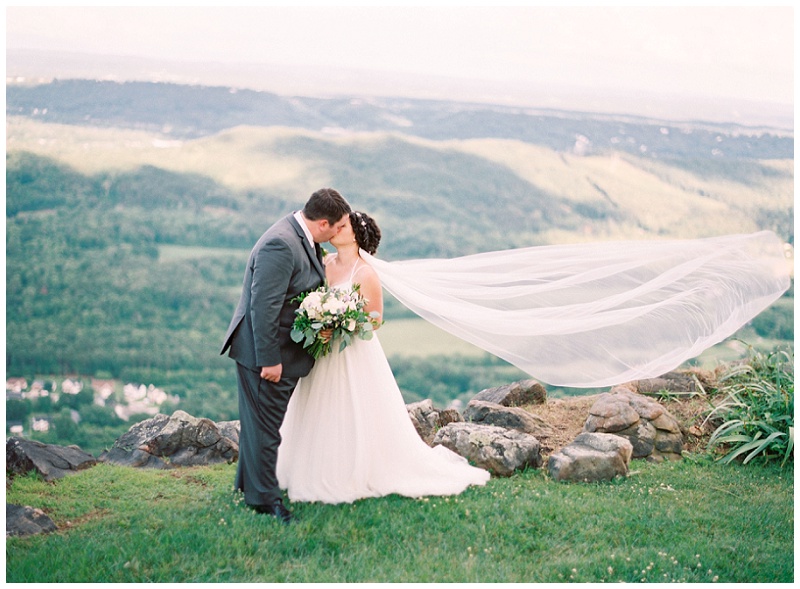 couple walking on bridge Grandview venue