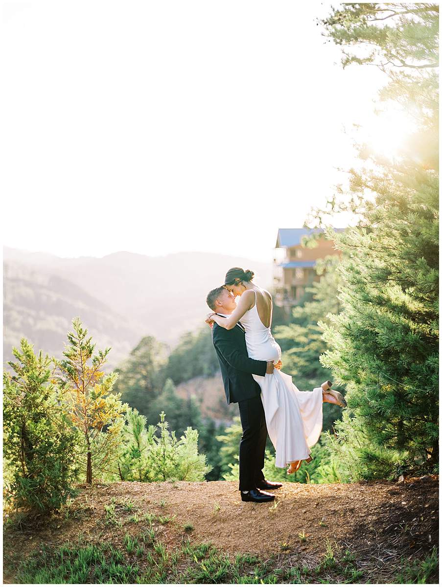 bride and groom embrace Smoky Mountains