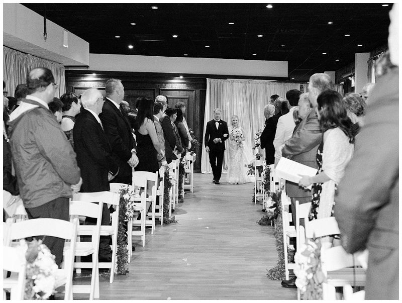 bride walking down aisle emotional