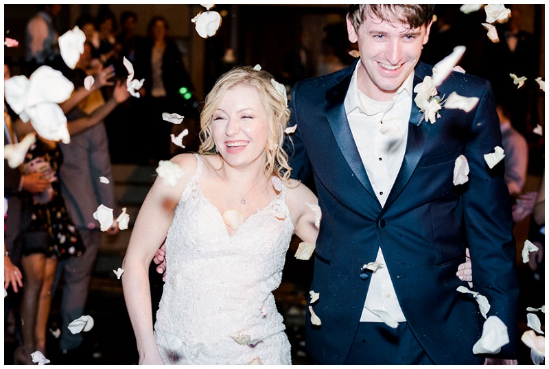 elegant flower petal toss exit at Mississippi wedding reception