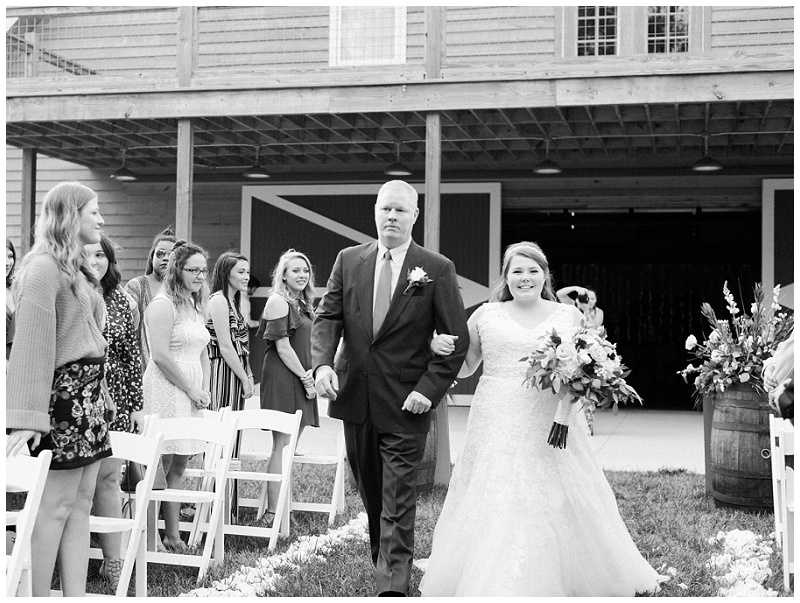 bride walking down aisle emotional