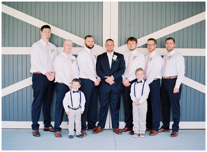 groomsmen stylish portraits barn venue