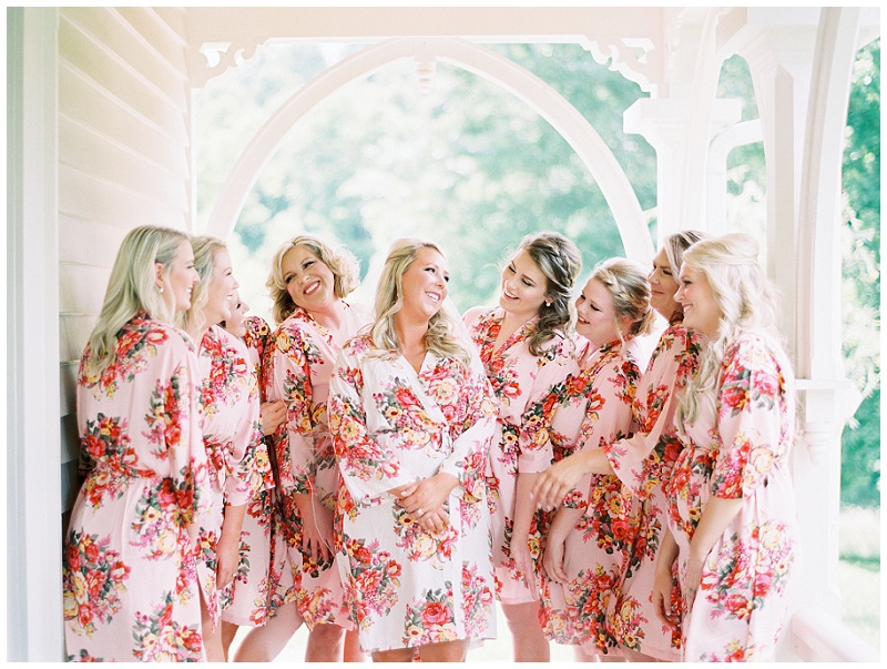 bridesmaids in robes before getting ready on wedding day