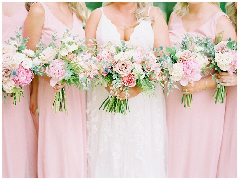 bridesmaids group photos holding bouquets Side Porch