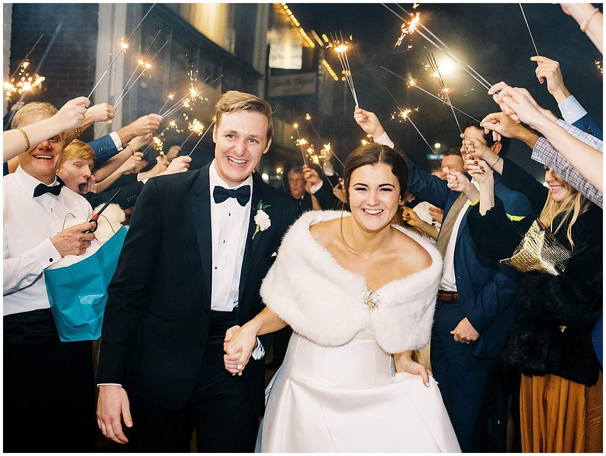 newlyweds exit reception moment