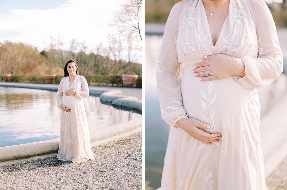Elegant maternity dress flowing in the wind at the Biltmore Estate.