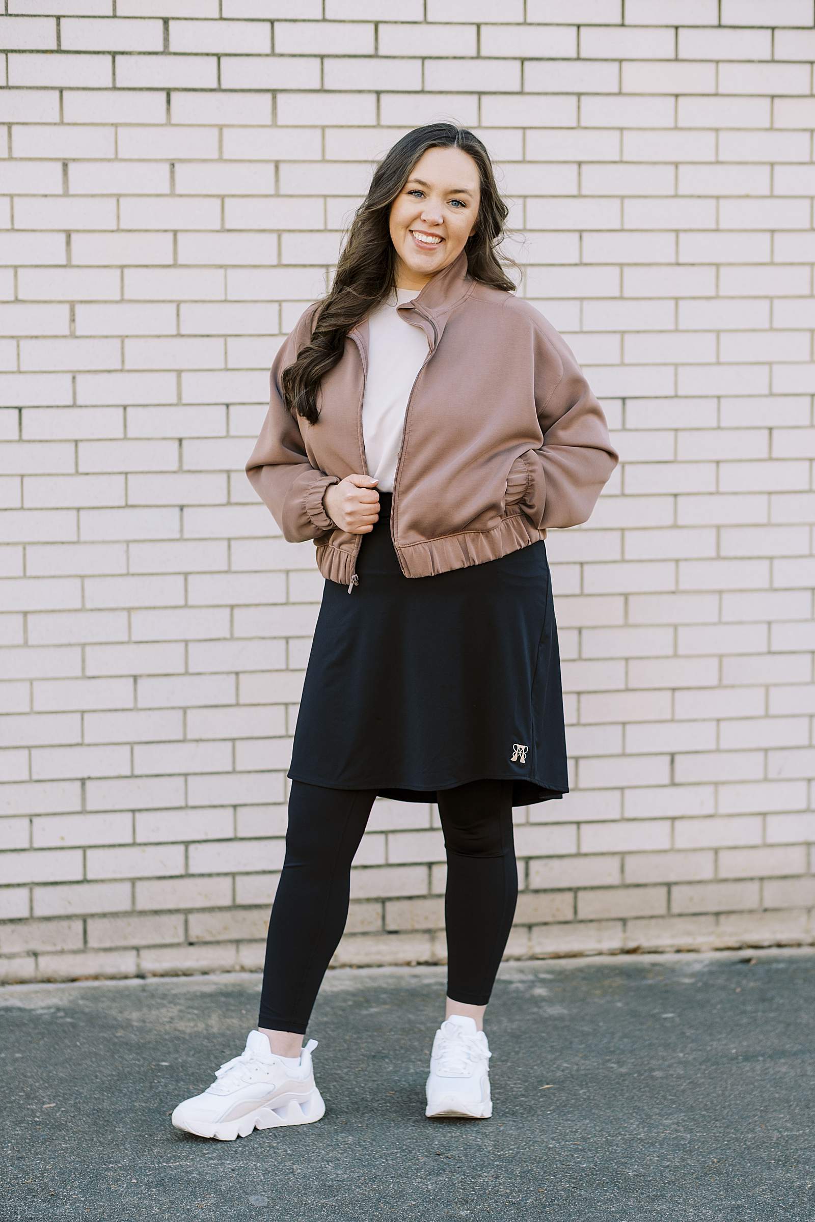 Woman wearing modest activewear in a city location