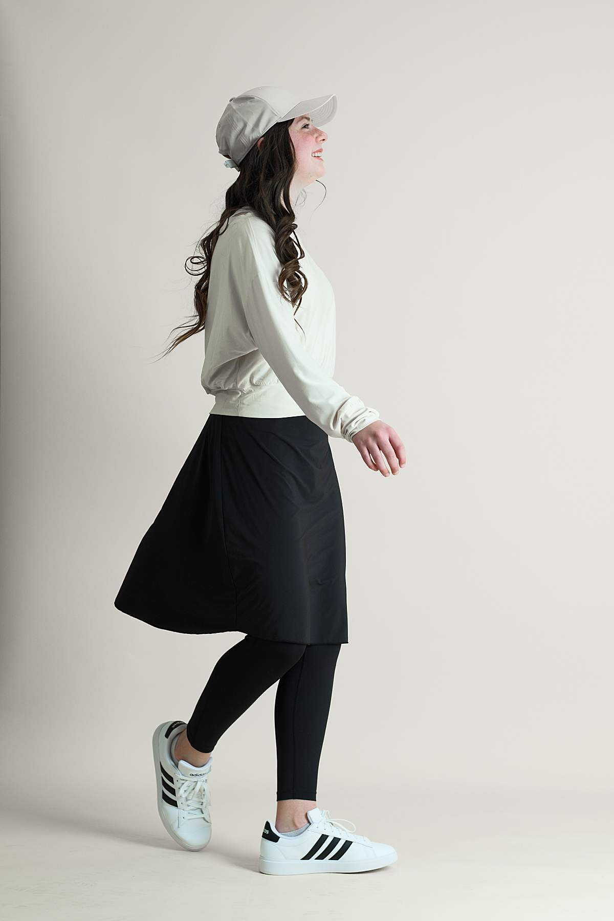 Girl wearing modest activewear featuring a skirted legging