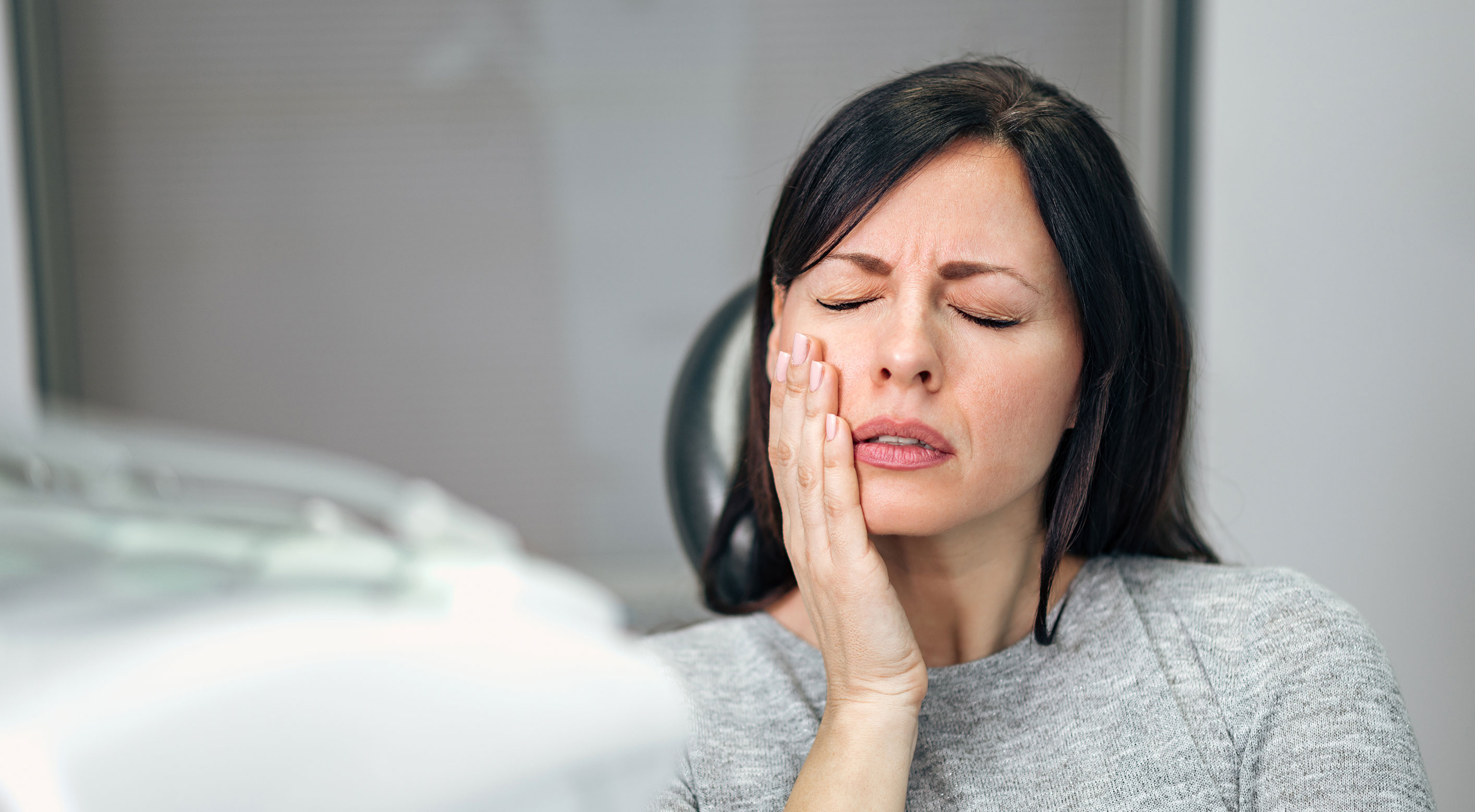 Woman with tooth pain