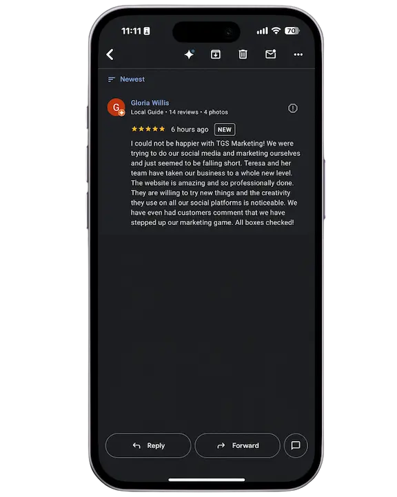 5-star Google review from Gloria Willis detailing how TGS Marketing elevated their social platforms