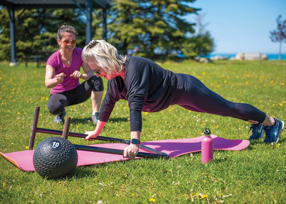 Sarah Heipel coaching a client outdoors