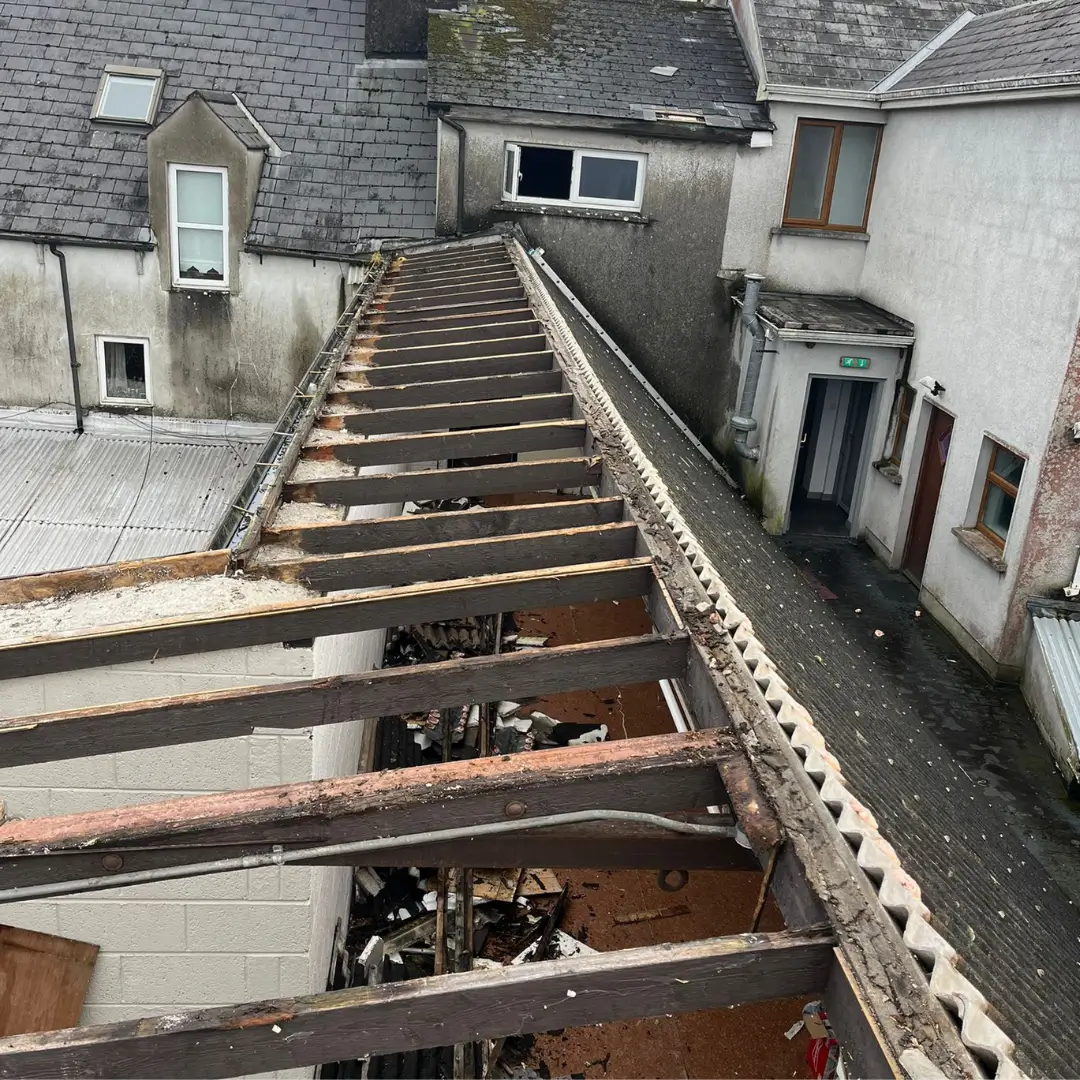 Old corrugated metal roof before replacement