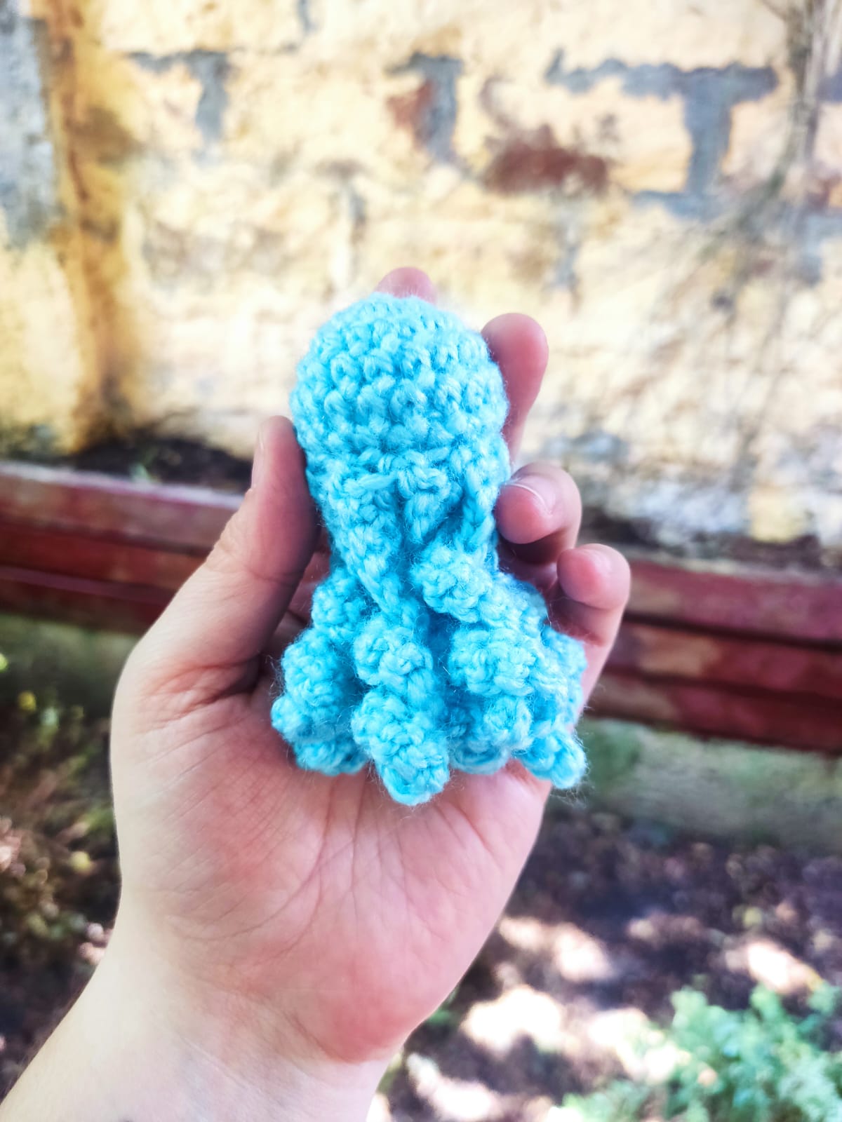 Blue crochet jellyfish close up