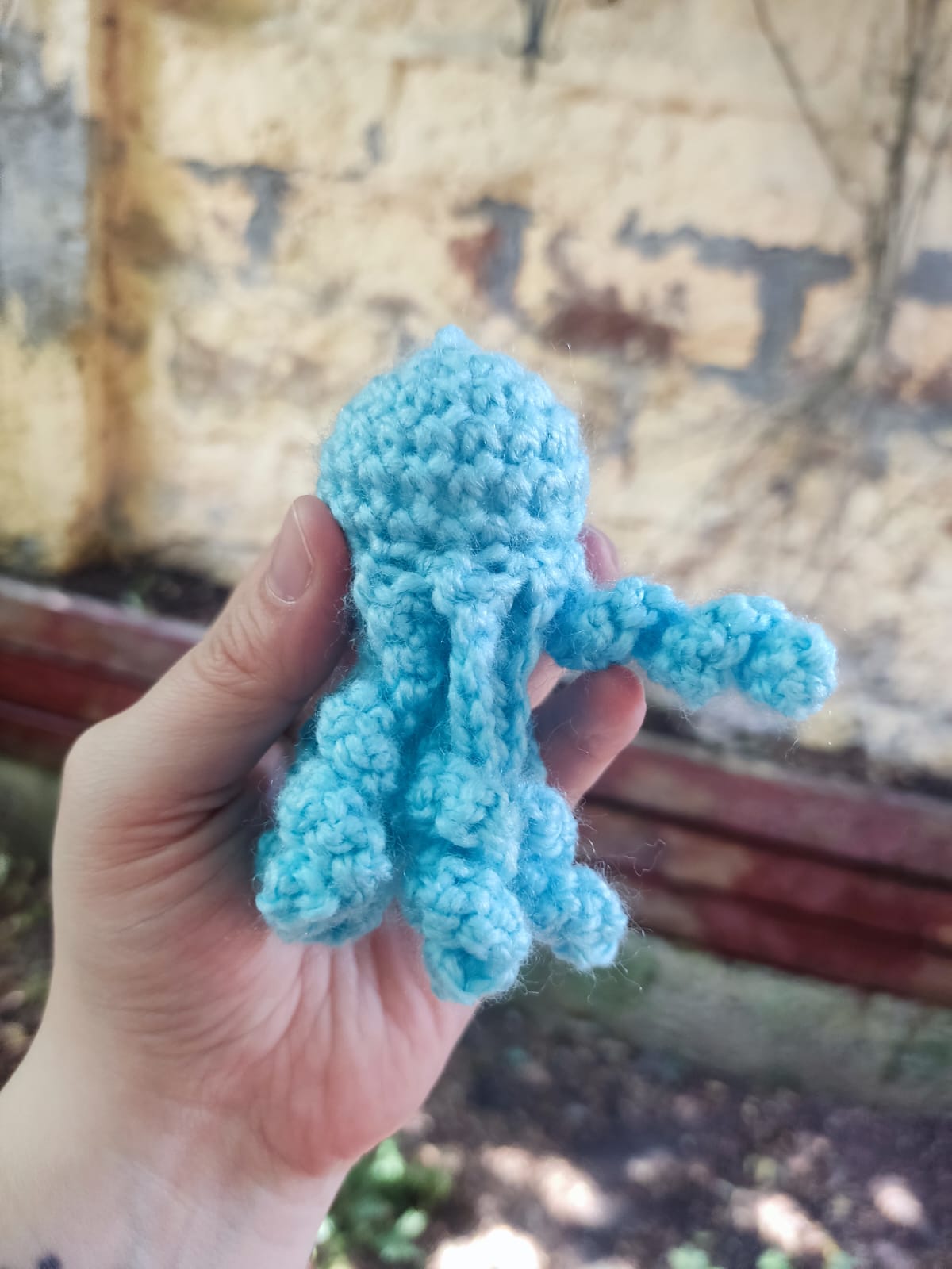 Tiny blue crochet jellyfish