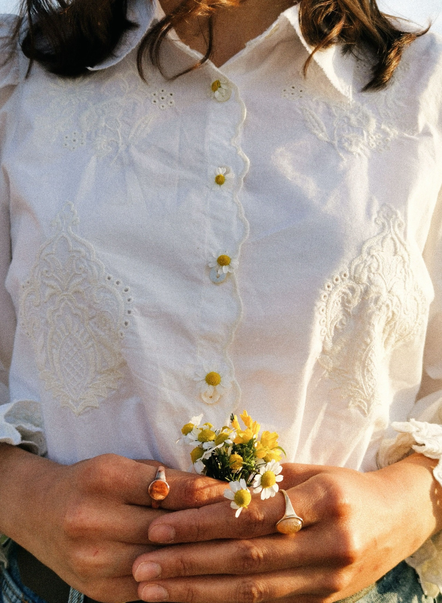 Hands holding flowers