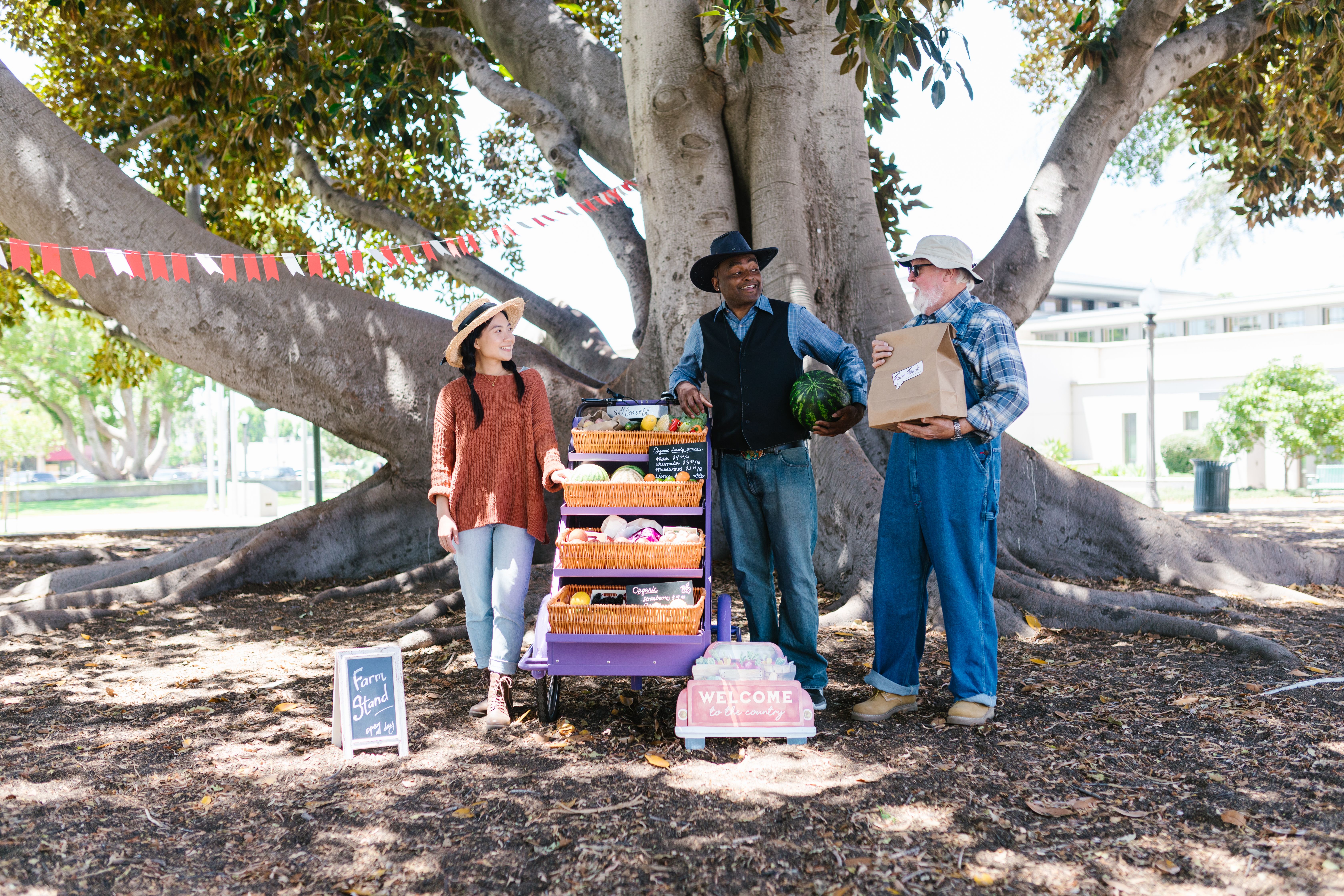 Local producers with a neighborhood market stand