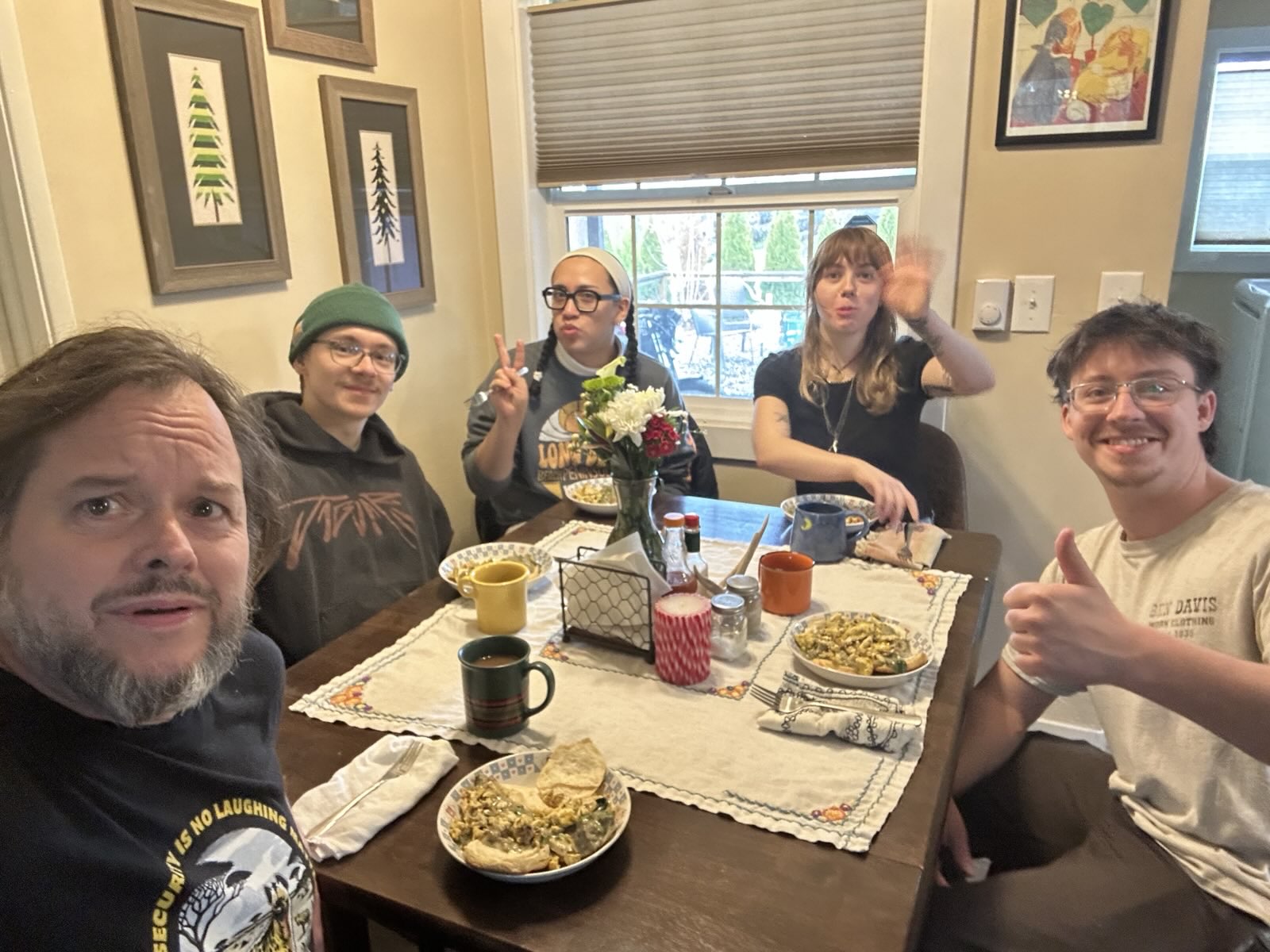 Family gathered around a kitchen table