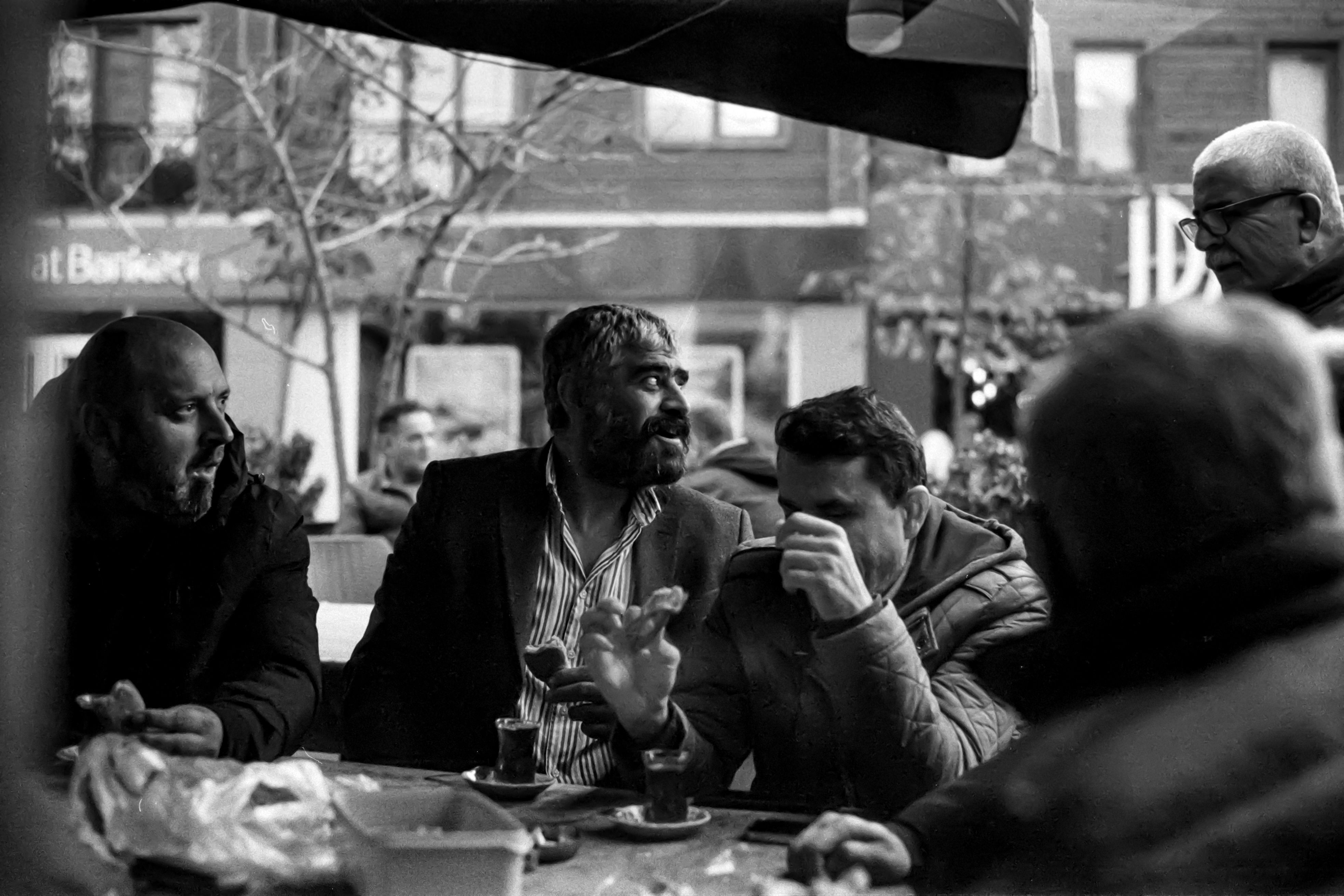 People talking together around a table