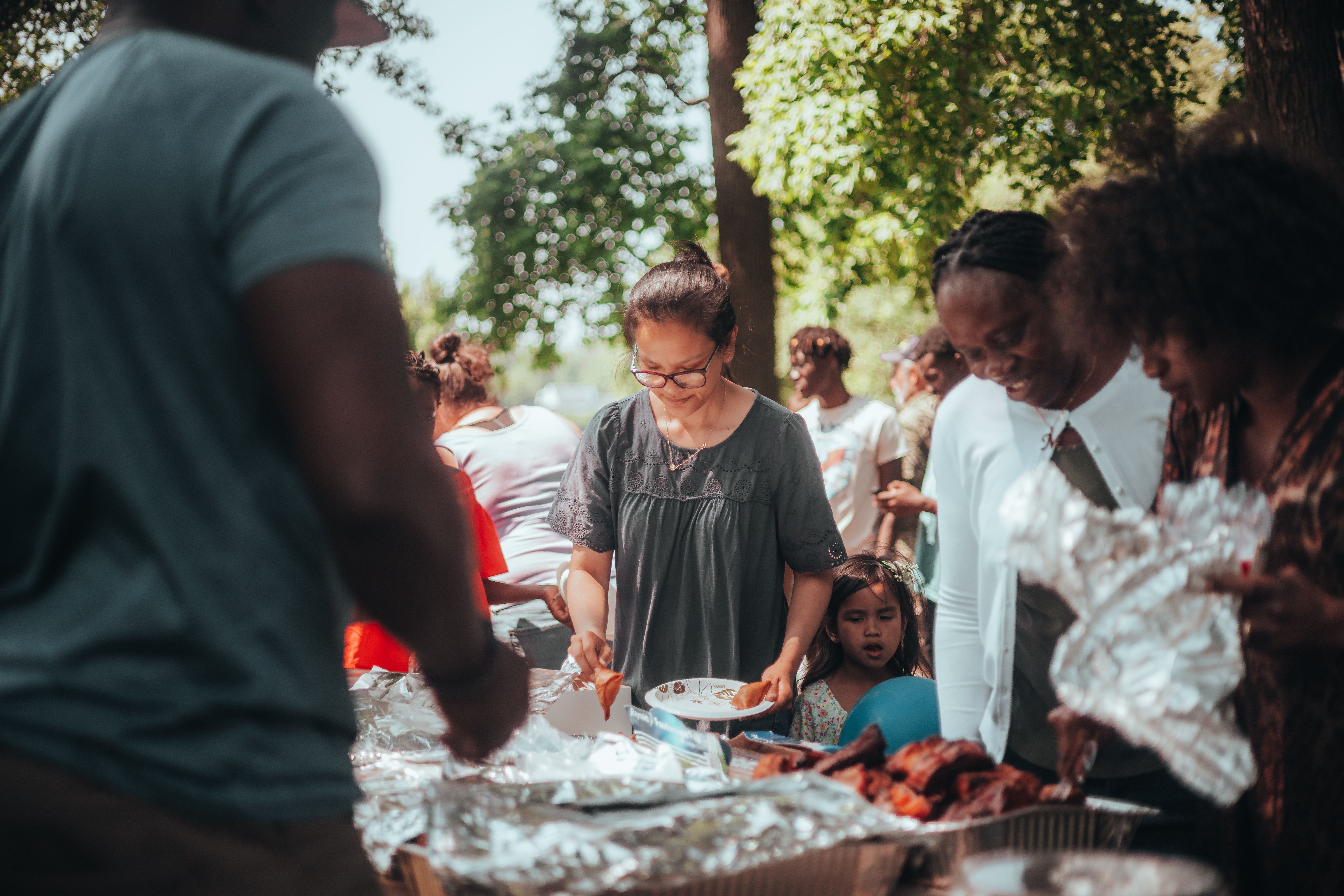 Volunteers preparing meals for community service