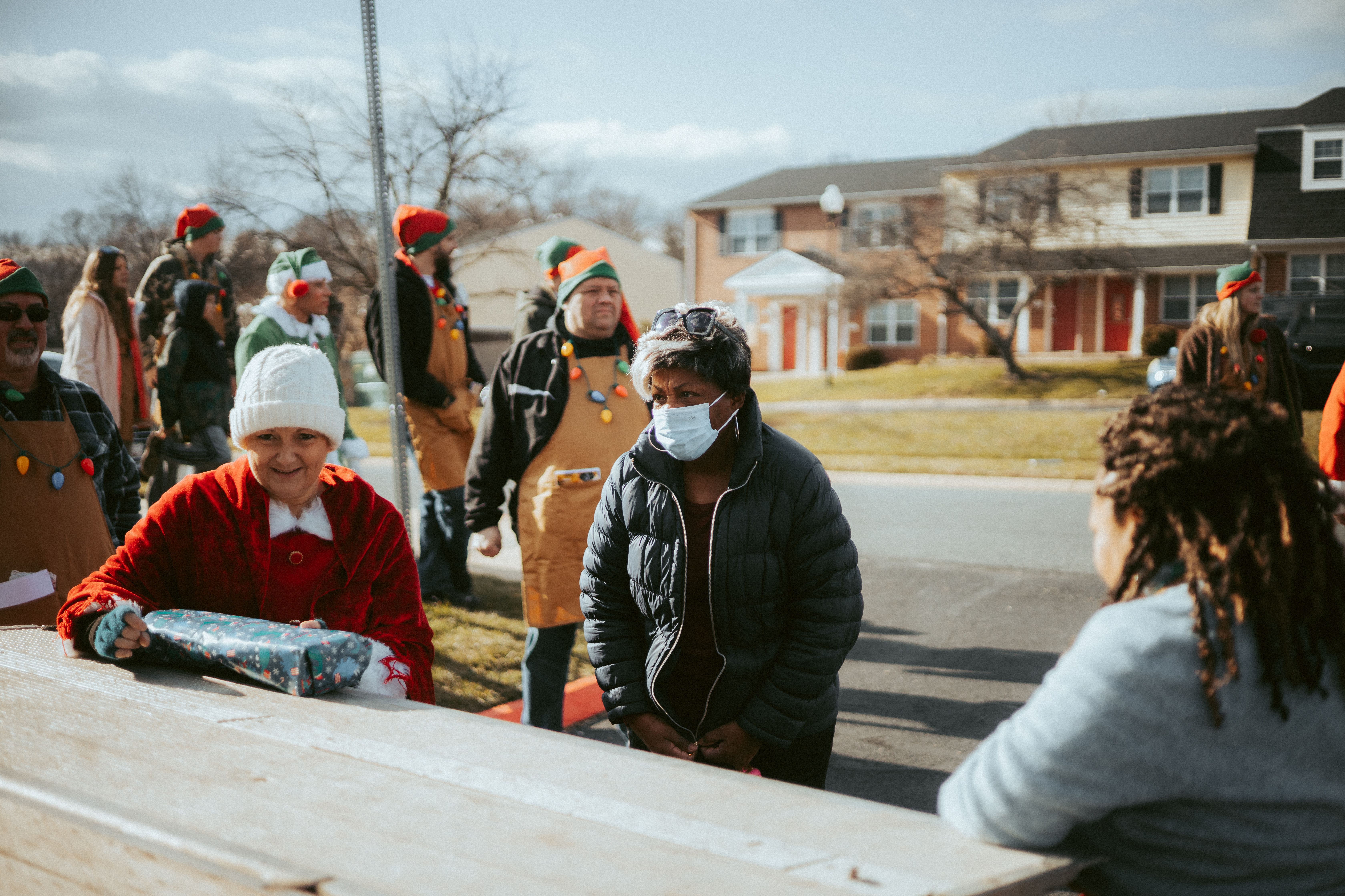 Neighbors gathering and helping one another