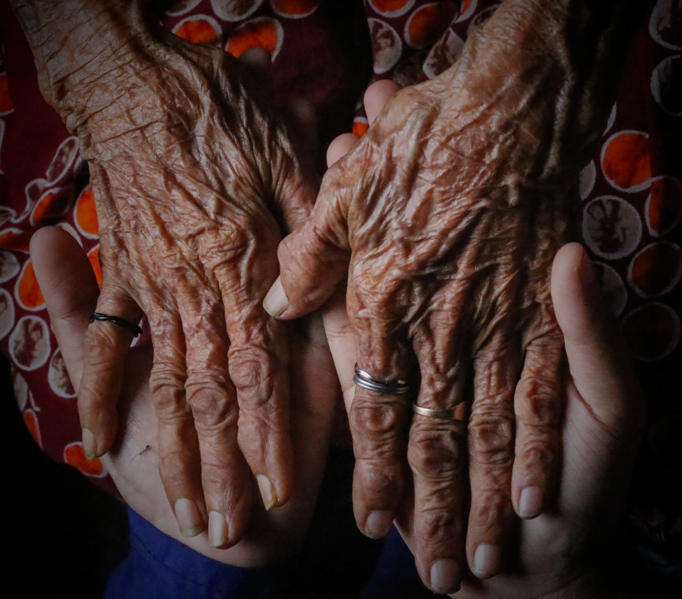 Older and younger hands together