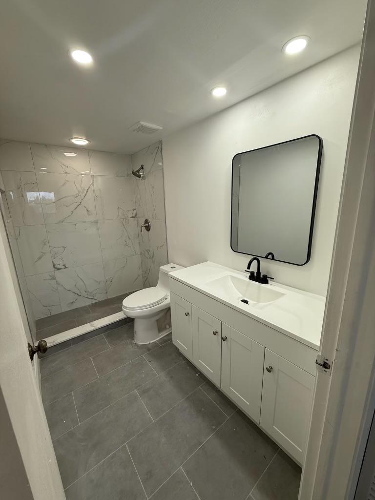 Modern bathroom remodel with black fixtures