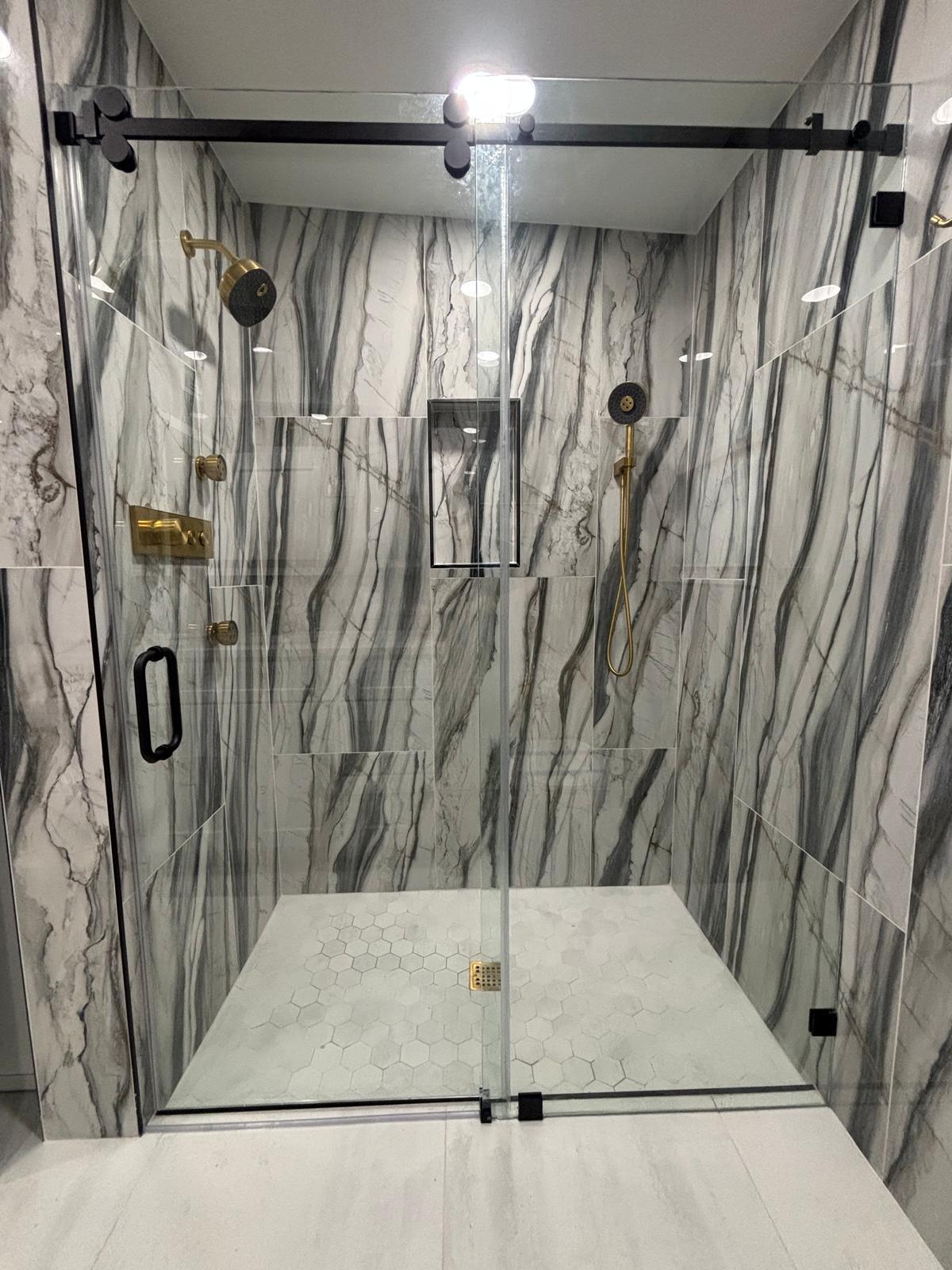Luxury walk-in shower with marble tile