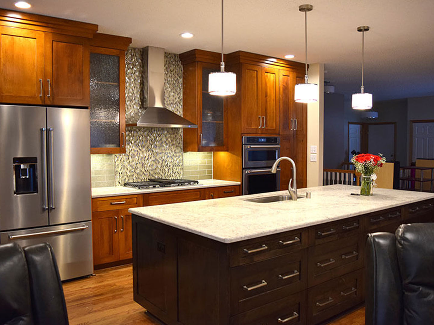 Espresso cabinets with white quartz island