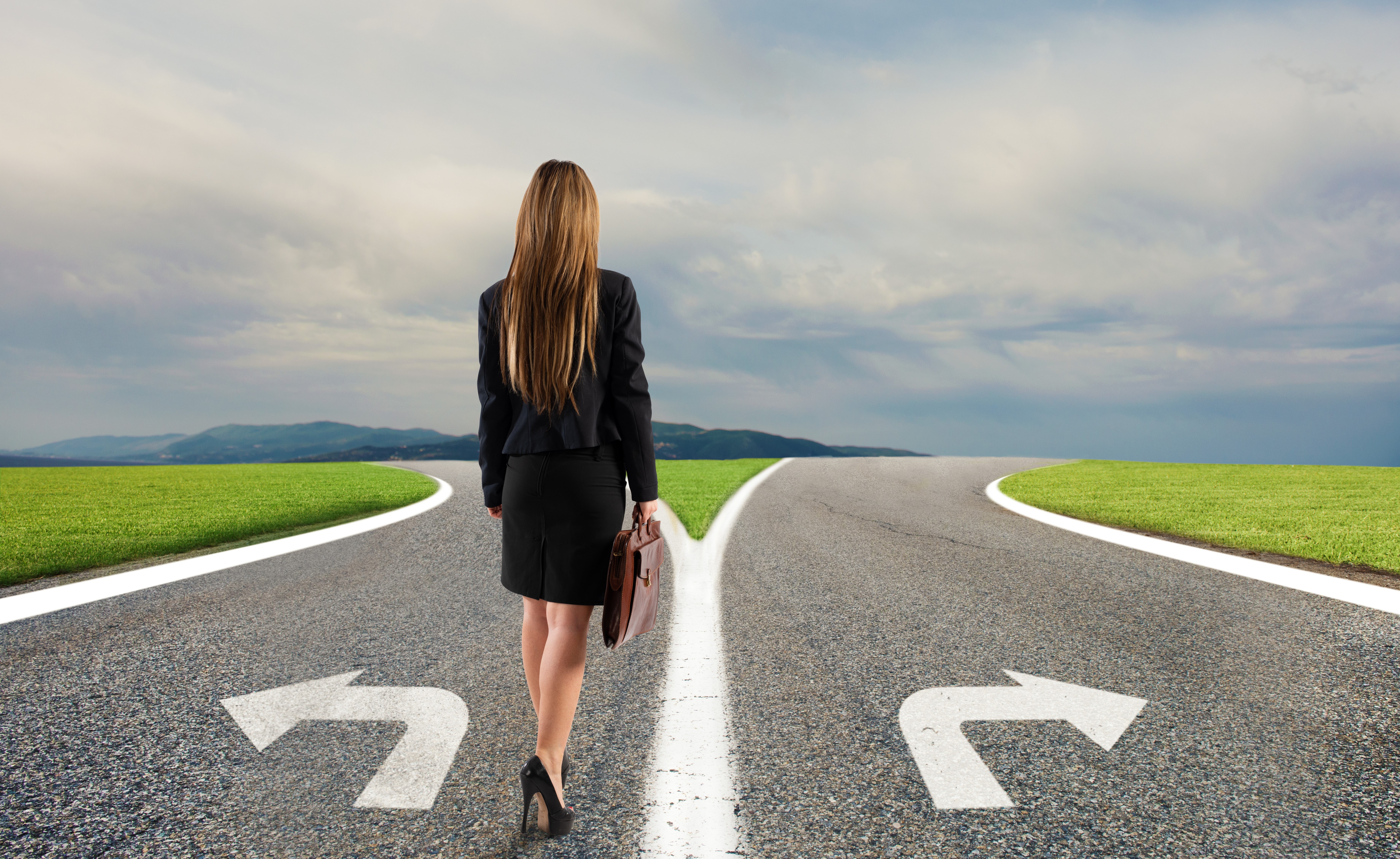 Professional woman at crossroads