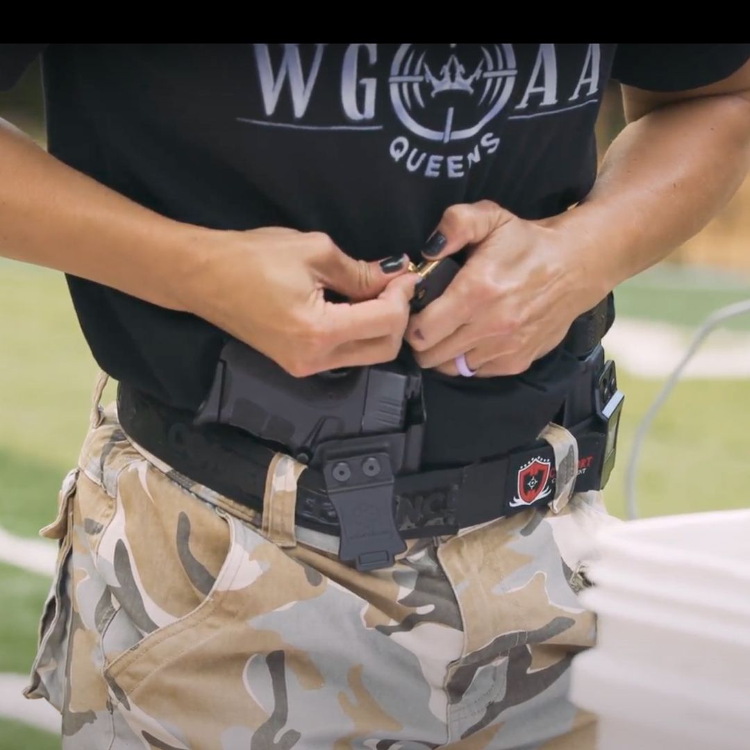 Confident armed woman