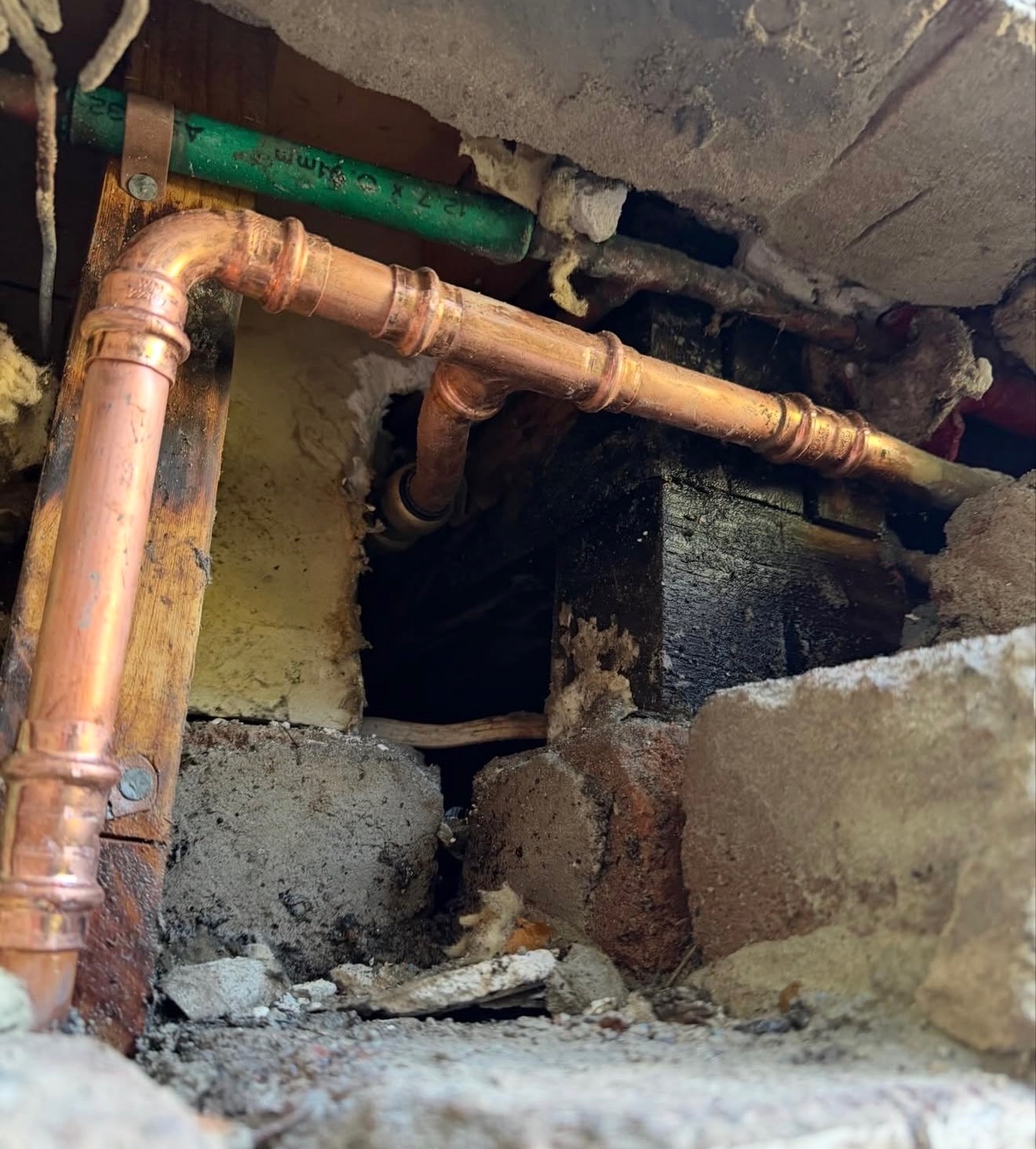 Copper pipework rough-in behind the wall by Brab Plumbing