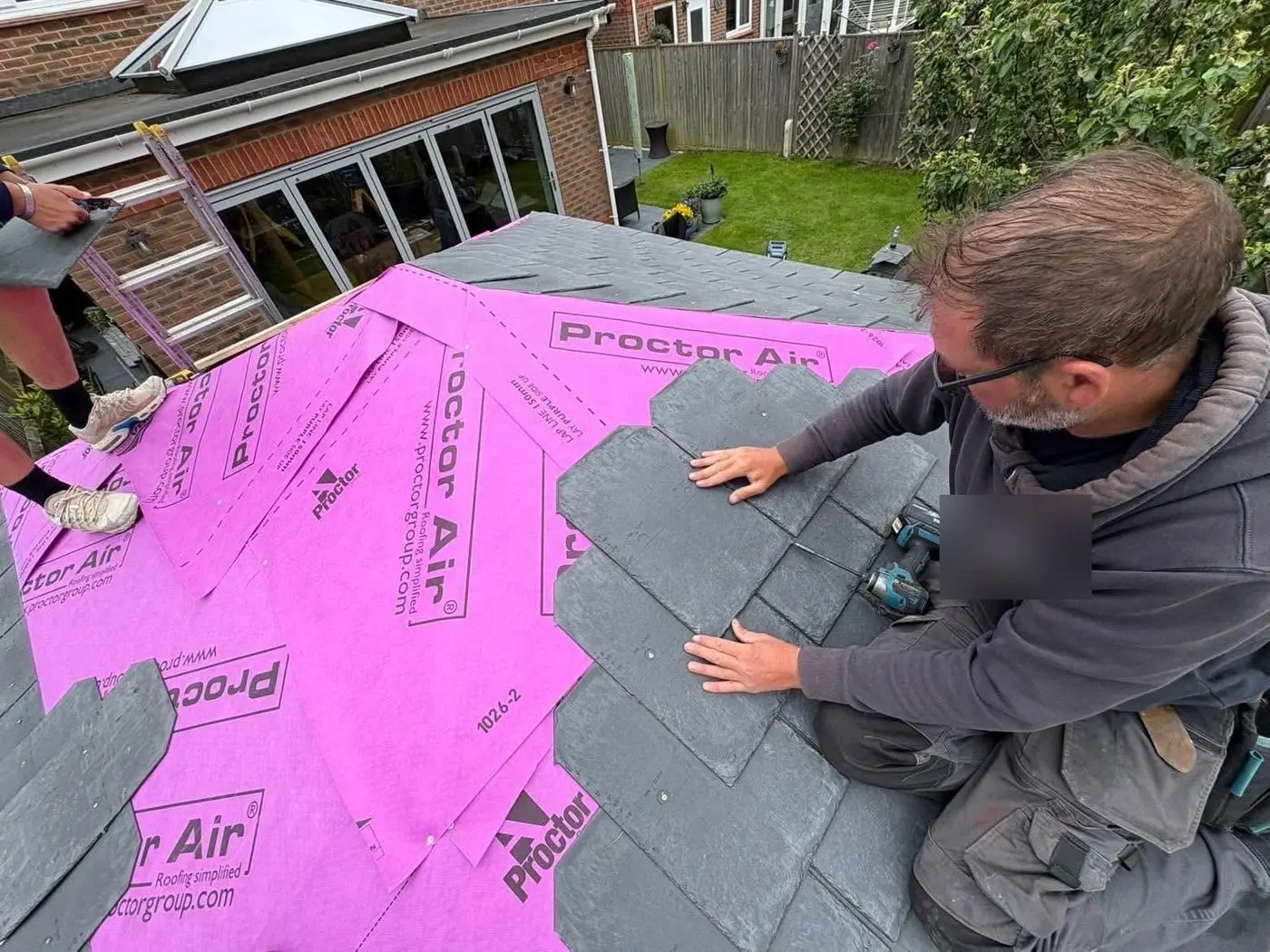 Natural slates being fixed, Prime Roofing & Guttering, Oxfordshire