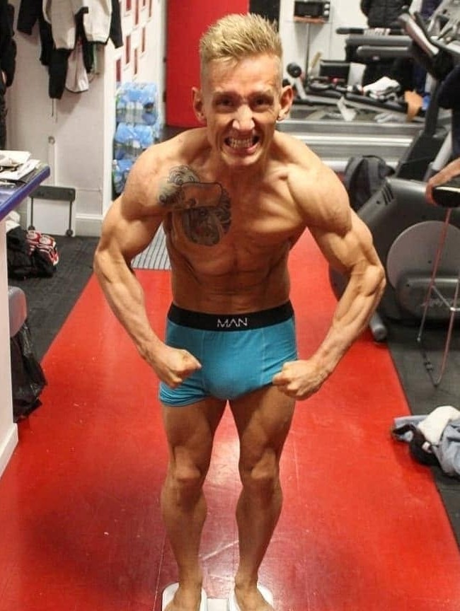 Tom on the scales at a fight camp weigh-in
