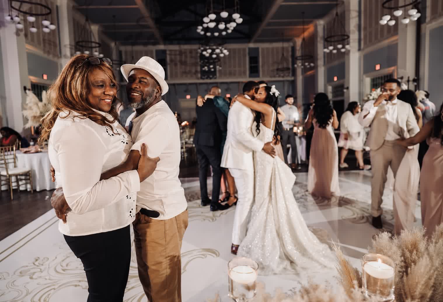 Newlyweds dancing together at their wedding reception