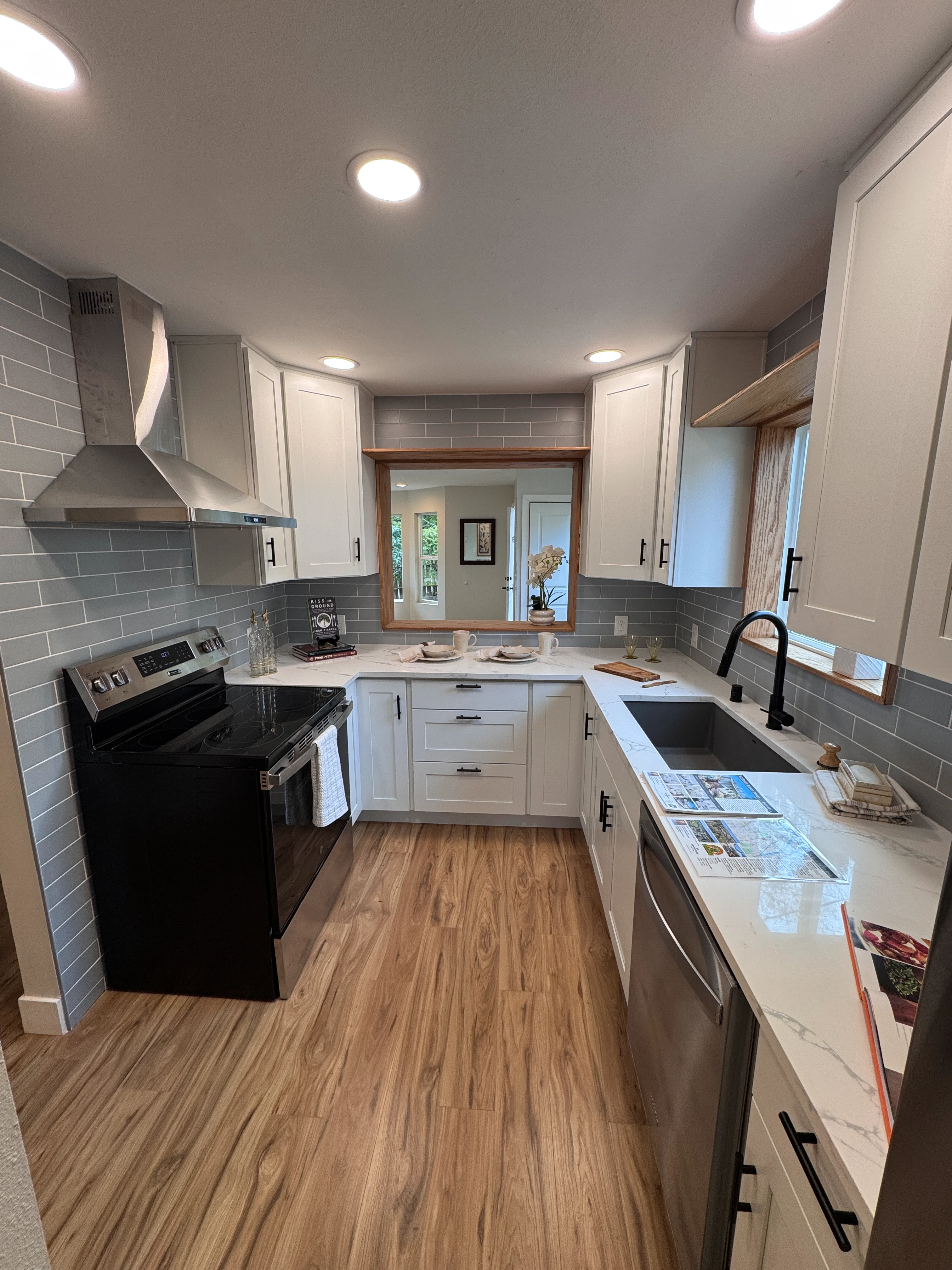 Bright modern kitchen with white cabinets Seattle