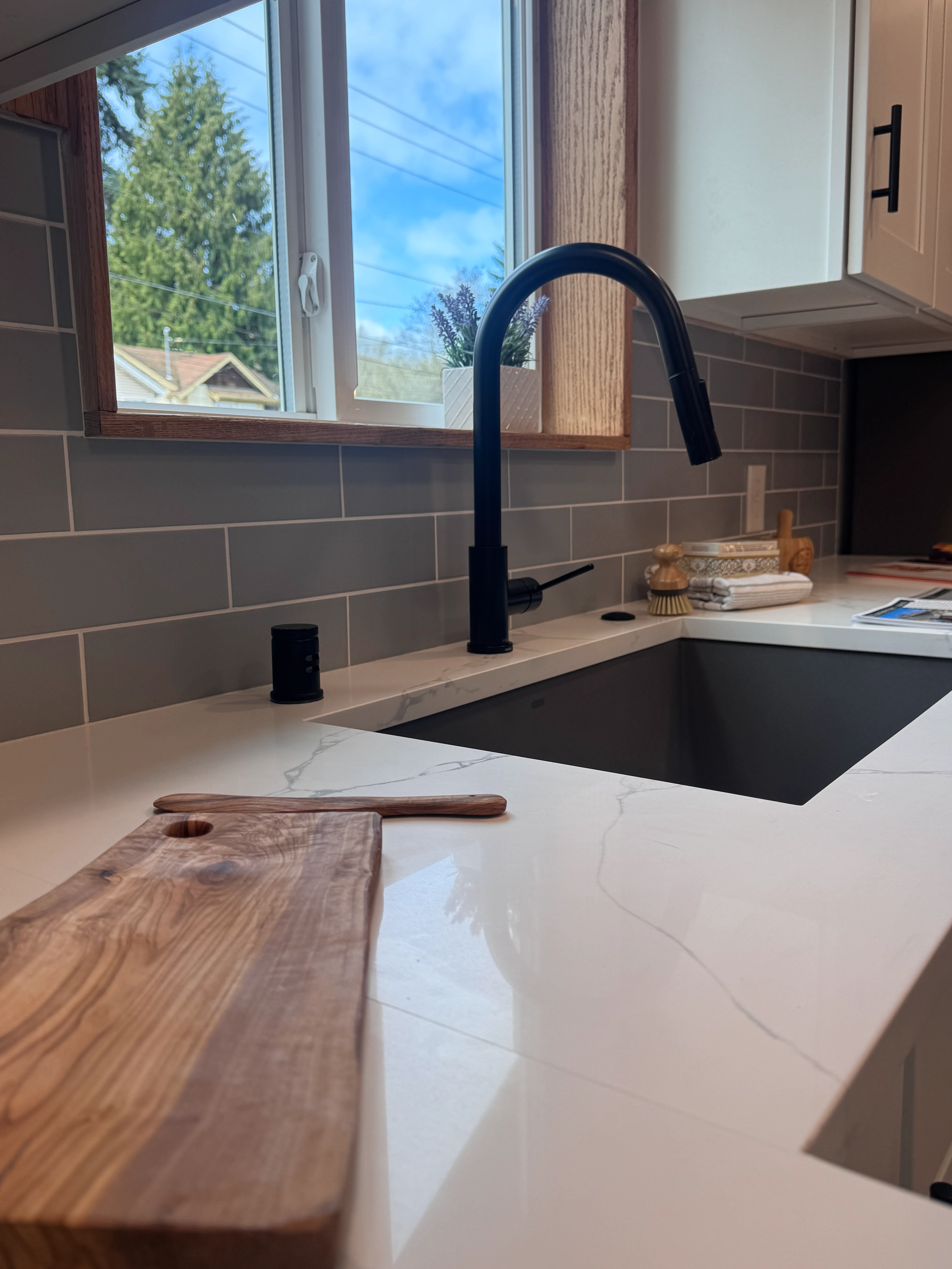 Bright modern kitchen with white cabinets Seattle