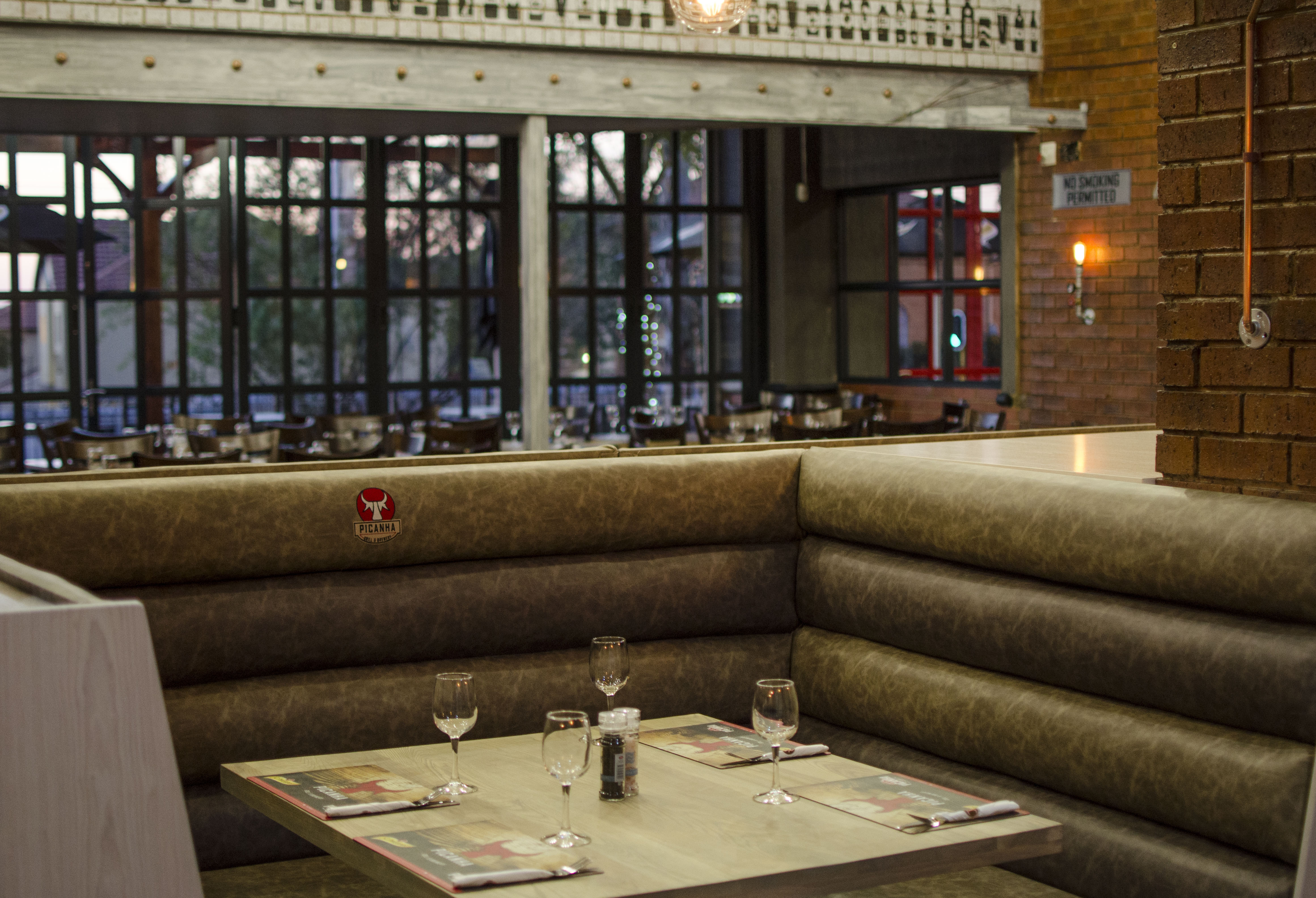 Dining booths inside Picanha Grill Bellairs Northriding