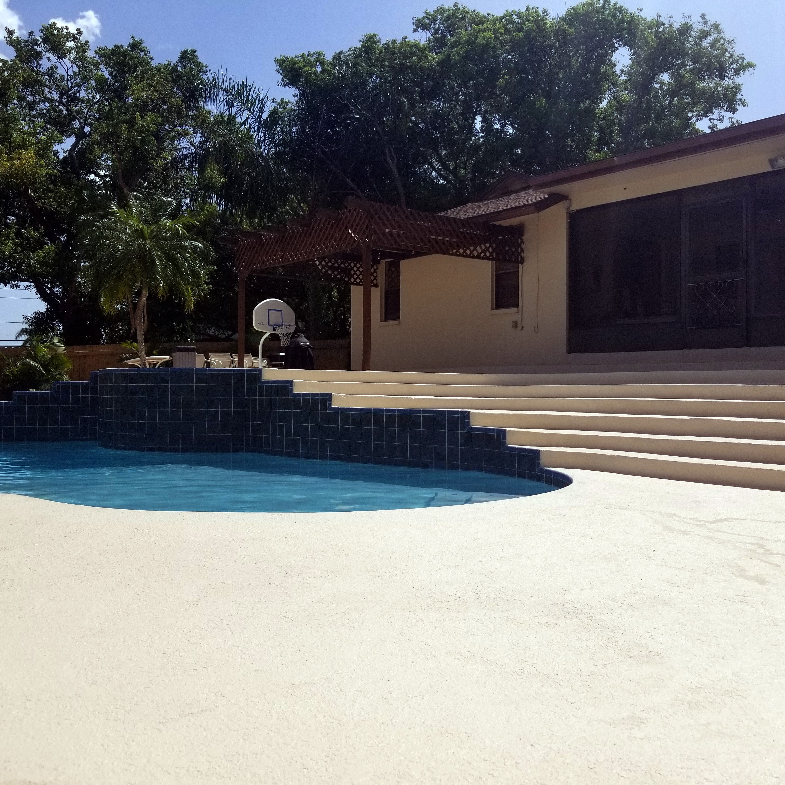 Resurfaced concrete pool deck